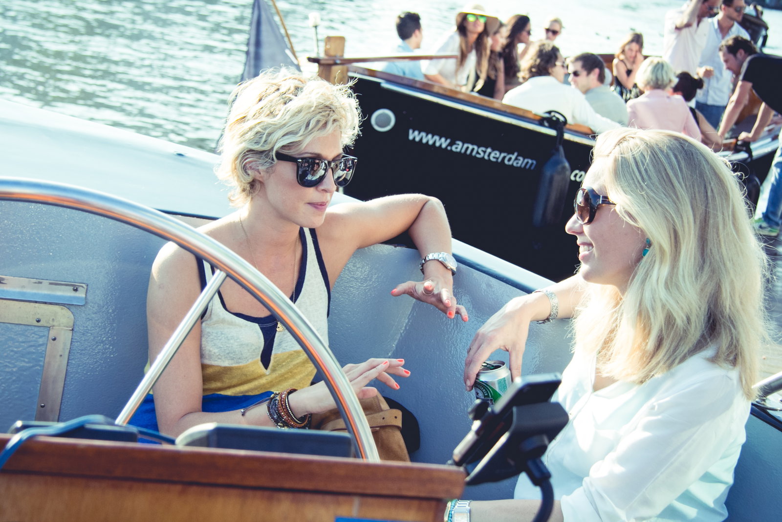 What are the costs of different dinner packages on a boat?